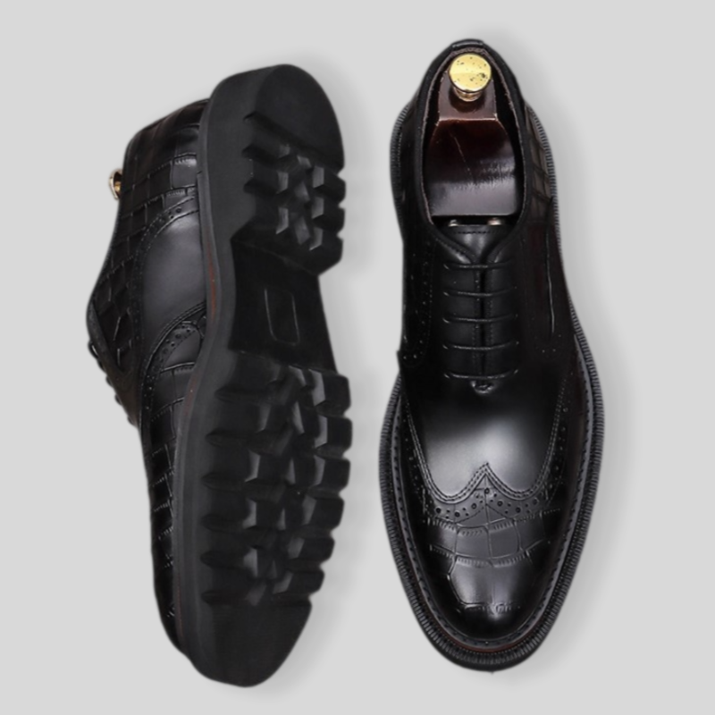 Black men's wingtip brogue oxford shoes with chunky lug sole, lace-up