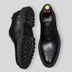 Black men's wingtip brogue oxford shoes with chunky lug sole, lace-up