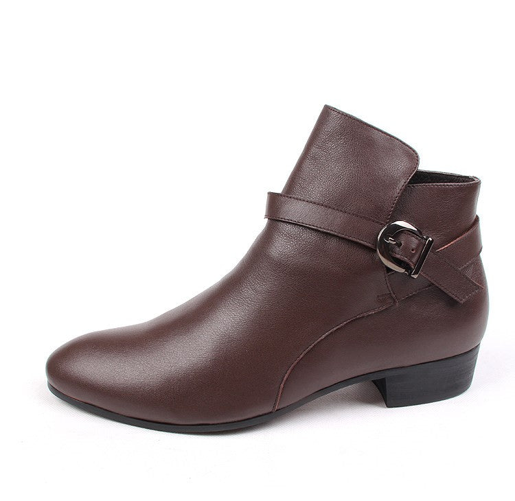 Brown leather ankle boots with side buckle strap and pointed toe, mid low heel.
