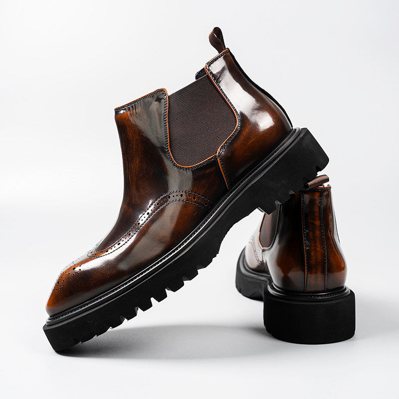 Dark brown leather Chelsea dress boots with elastic gore, brogue design, and block heel sole
