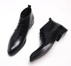 Black leather lace-up dress boots, side view showing heel and lace closure