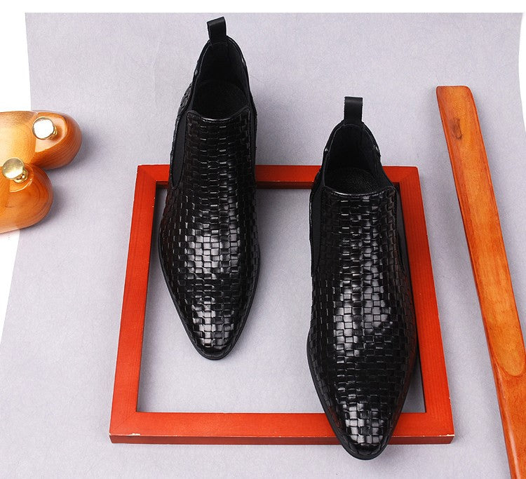 Black leather side-zip dress boots with woven pattern and thick sole, pair on box