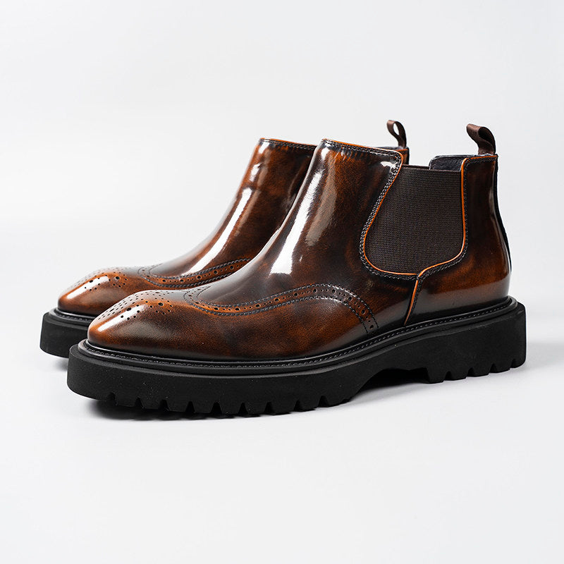 Dark brown leather Chelsea dress boots with elastic side panels and rugged tread sole