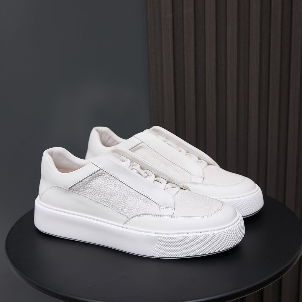White genuine leather lace-up sneakers with padded collar and textured rubber sole