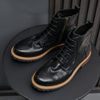 Men's black leather dress boots, lace-up with side zip and pointed toe.