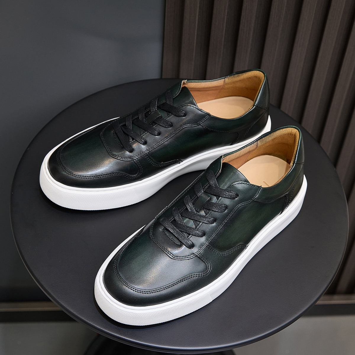 Men's dark green leather sneakers, lace-up design with white rubber platform sole