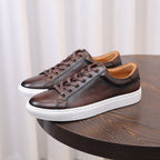 Men's dark brown leather lace-up sneakers, padded collar, white sole