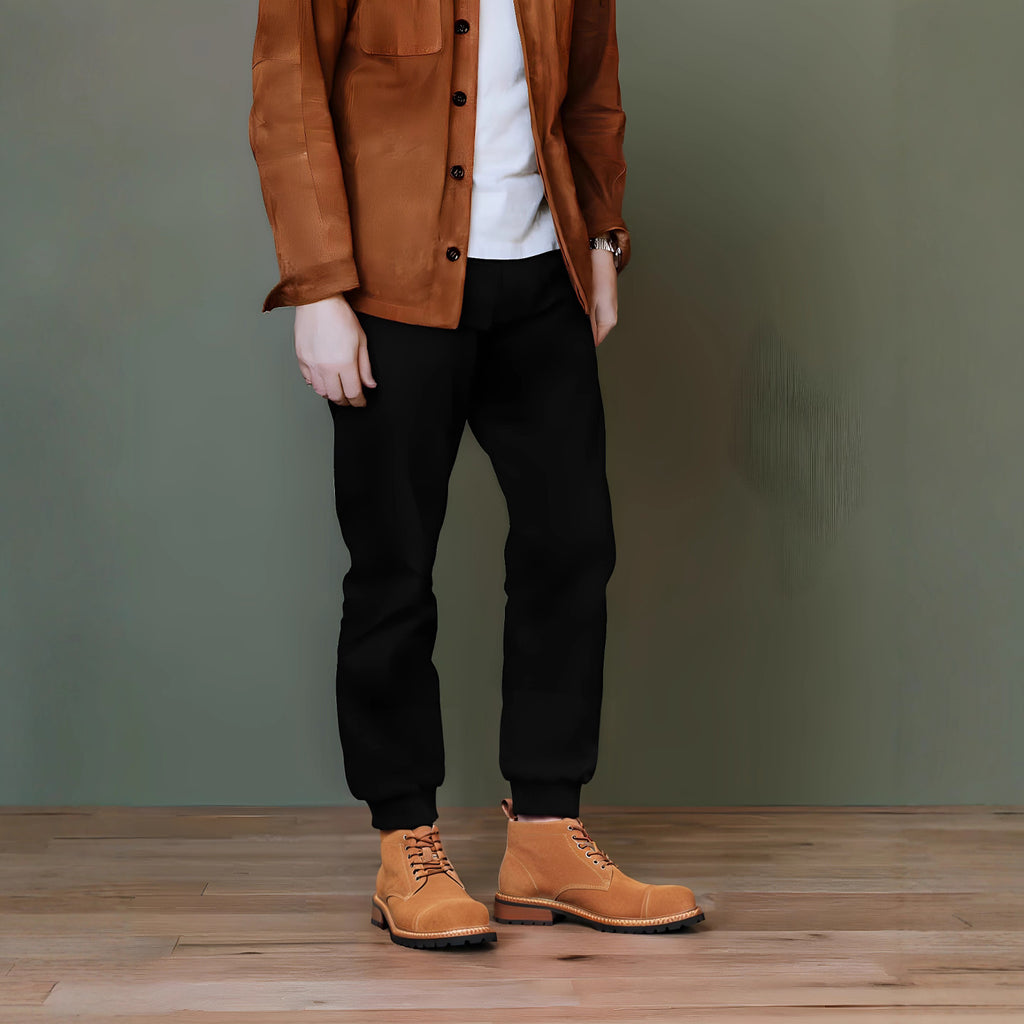 Men's tan suede lace-up chukka boots with round toe and contrast welt edging