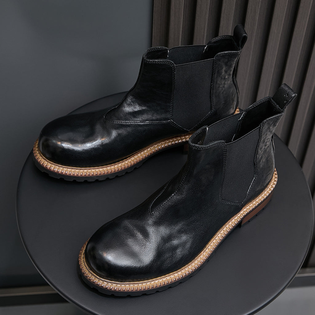 Men's pointed-toe suede Chelsea dress boots, black, angled pair view