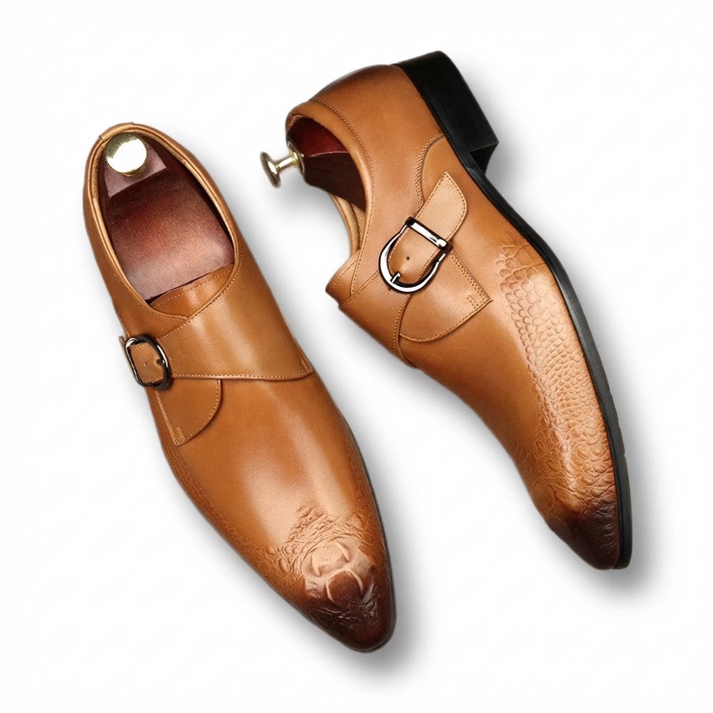 Elegant brown crocodile embossed leather single monk strap shoes with a sleek professional silhouette.