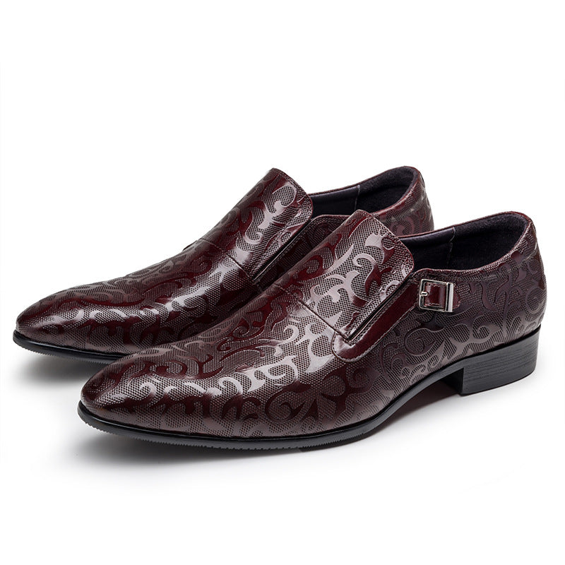 Elegant burgundy wine red engraved leather monk strap shoes with a sleek silver buckle.