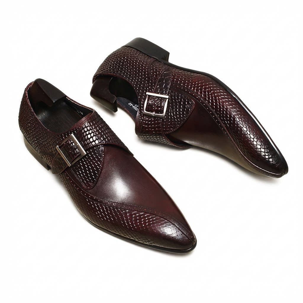 Elegant burgundy wine red leather single monk strap shoes featuring a sleek silver buckle.