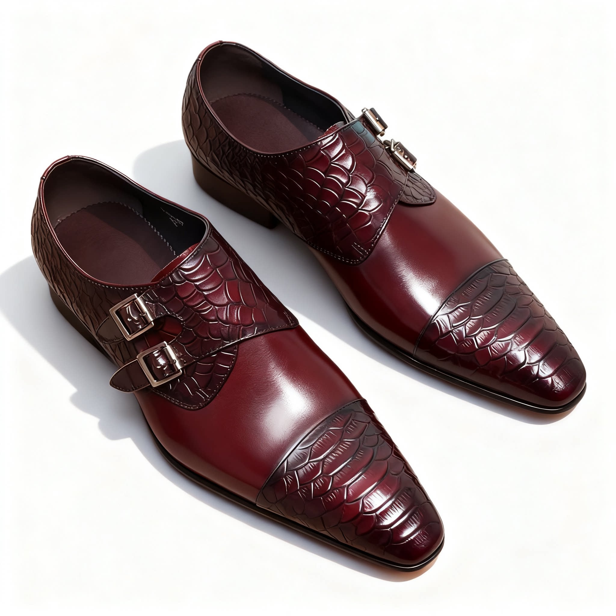 Elegant burgundy wine red leather single monk strap shoes featuring a sleek silver buckle.