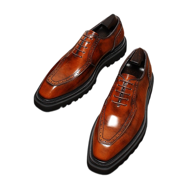 Men's brown wingtip brogue oxford shoes with chunky lug sole and lace-up design