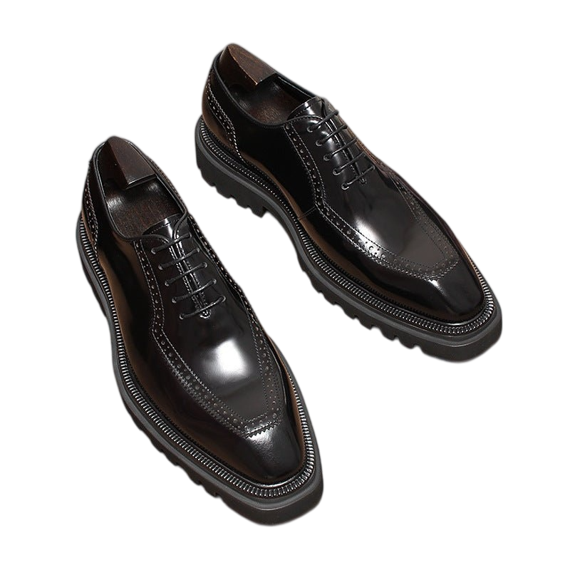 Men's chunky lug sole wingtip brogue oxfords, black leather lace-up pair