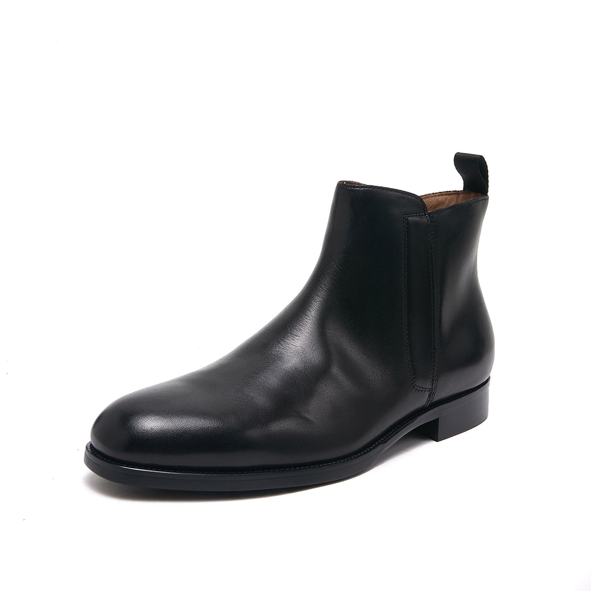 Pointed-toe leather side-zip dress boot in black, side view on white background