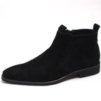 Black side-zip dress boots with thick sole, suede-look upper, ankle height.