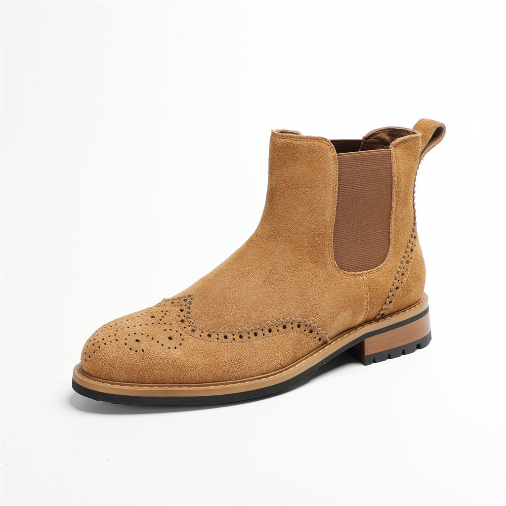 Tan suede pointed-toe Chelsea boot with elastic side panels and brogue perforations