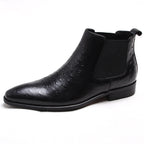 Black leather slip-on Chelsea dress boot with side elastic gore and low block heel