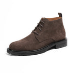 Men's suede chukka boots, plain toe, lace-up closure, dark brown, thick rubber sole.