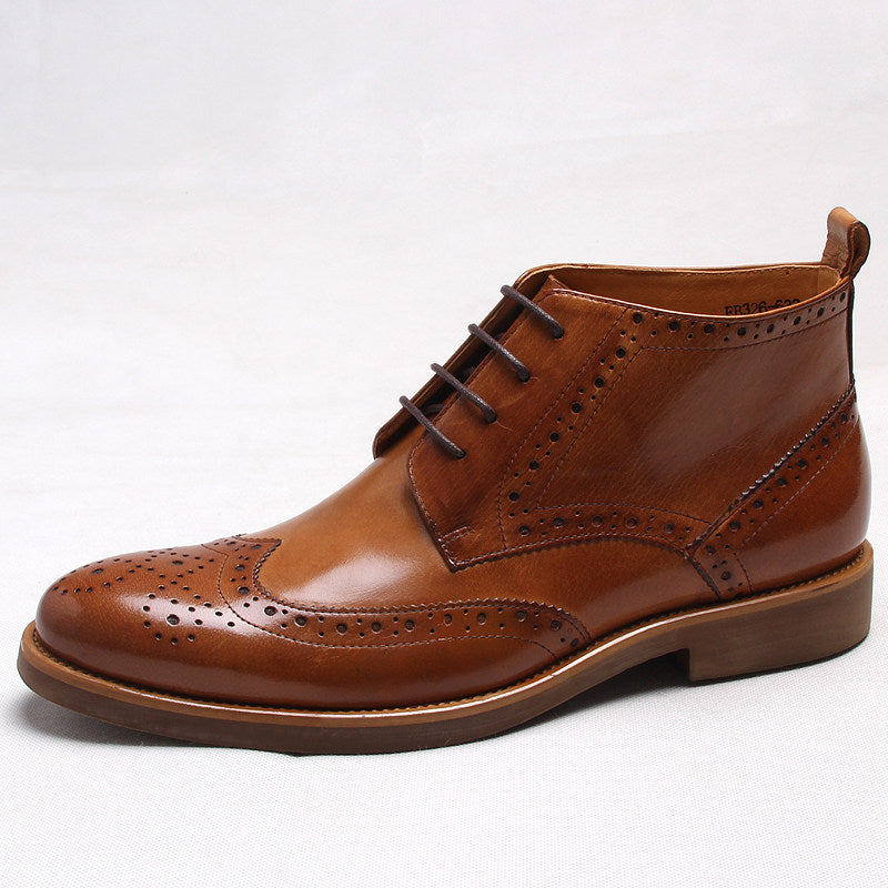 Men's brown wingtip lace-up dress boots with perforated detail and low heel