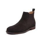 Dark brown suede Chelsea ankle boot with elastic side gore and tan welt stitching