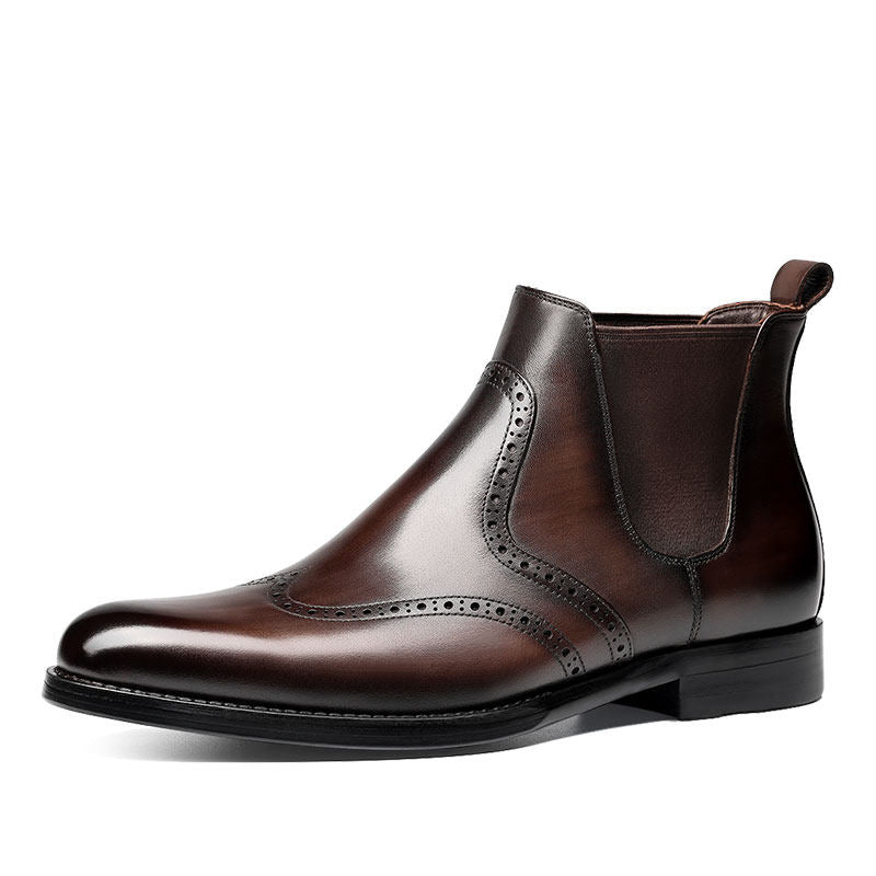 Brown leather chelsea dress boots with brogue-style toe and side elastic panels