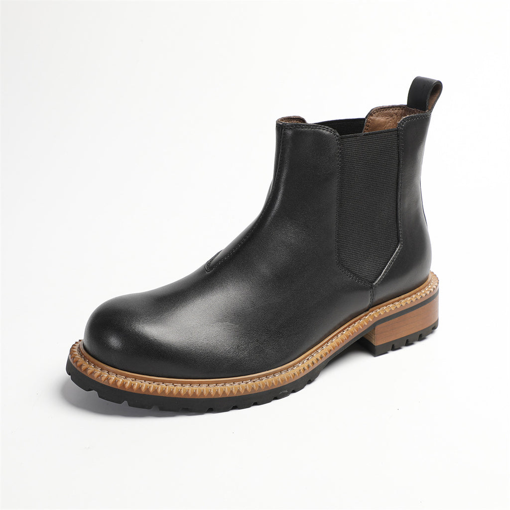 Men's pointed-toe Chelsea dress boots in black, elastic side panels and rugged outsole