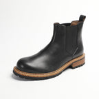 Men's pointed-toe Chelsea dress boots in black, elastic side panels and rugged outsole