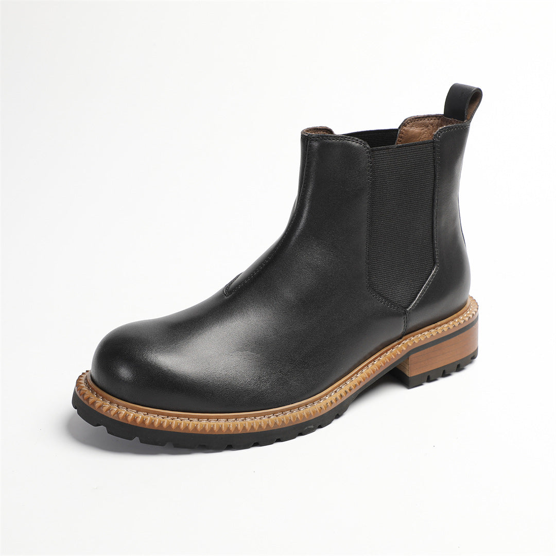 Men's pointed-toe Chelsea dress boots in black, elastic side panels and rugged outsole