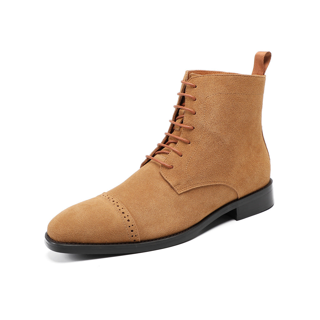Tan suede lace-up chukka boot with plain toe and black rubber sole